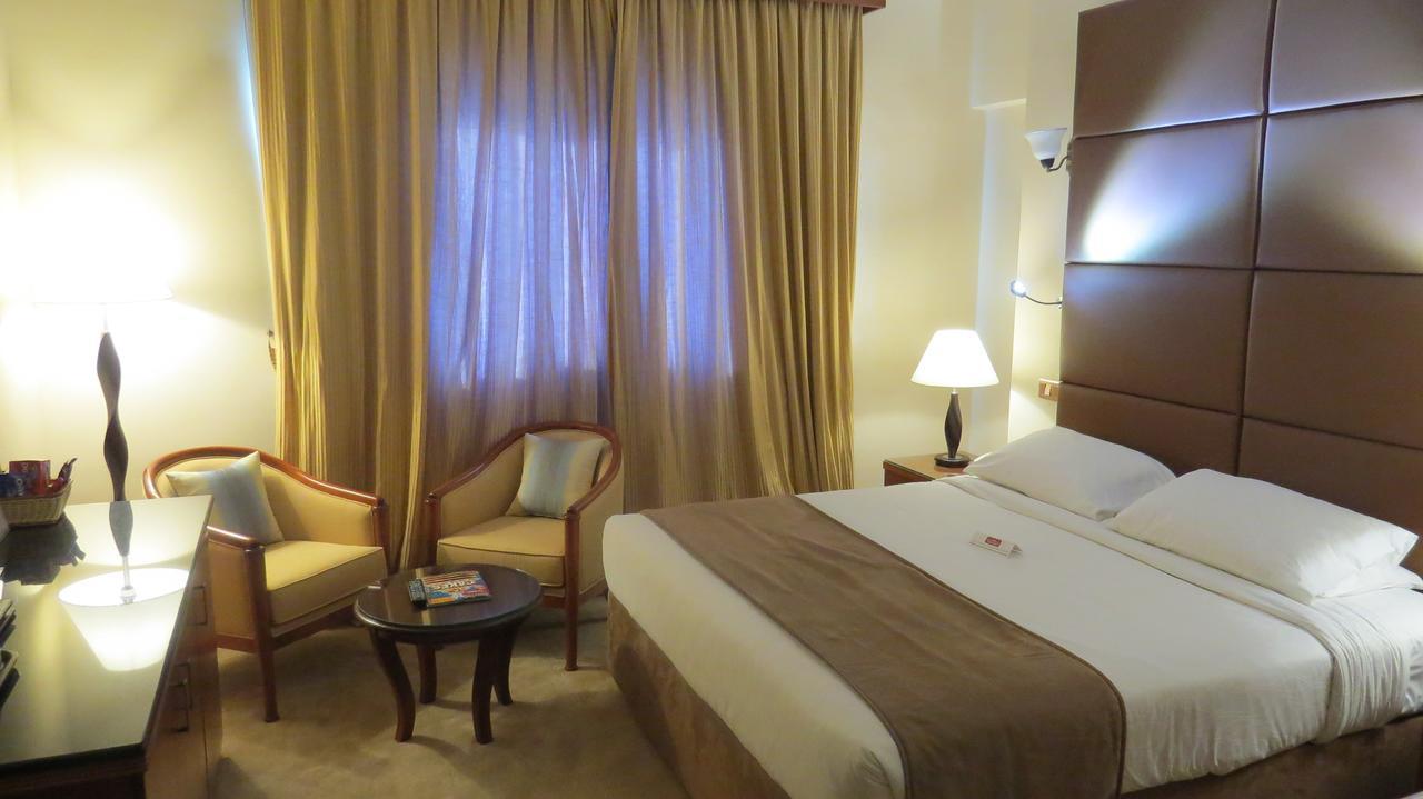 The Park Hotel Formerly Дубай Екстериор снимка